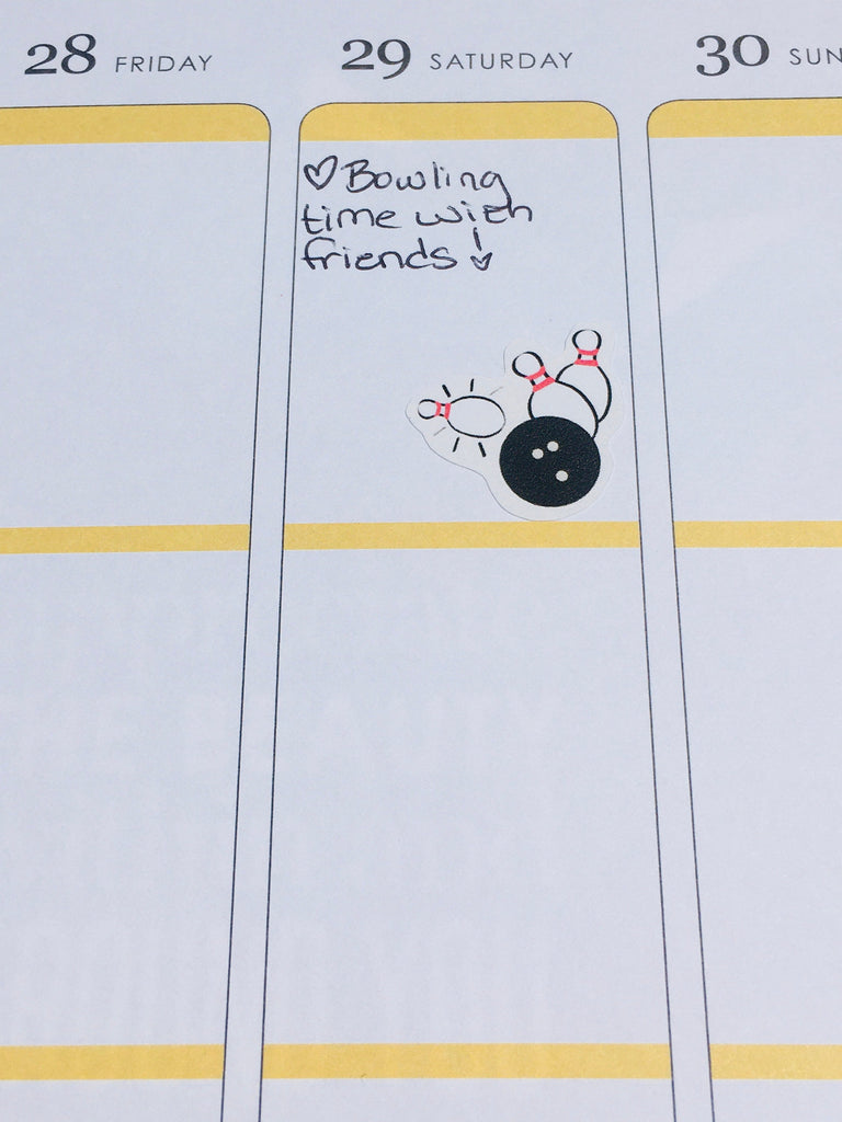 A close-up of an individual bowling planner sticker in a life planner.