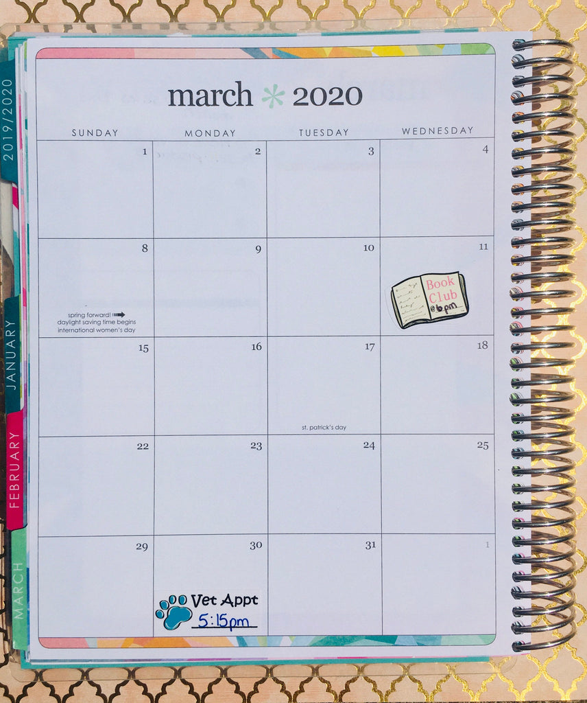A picture of an Erin Condren life planner with the Book Club planner sticker inside placed on a monthly page.