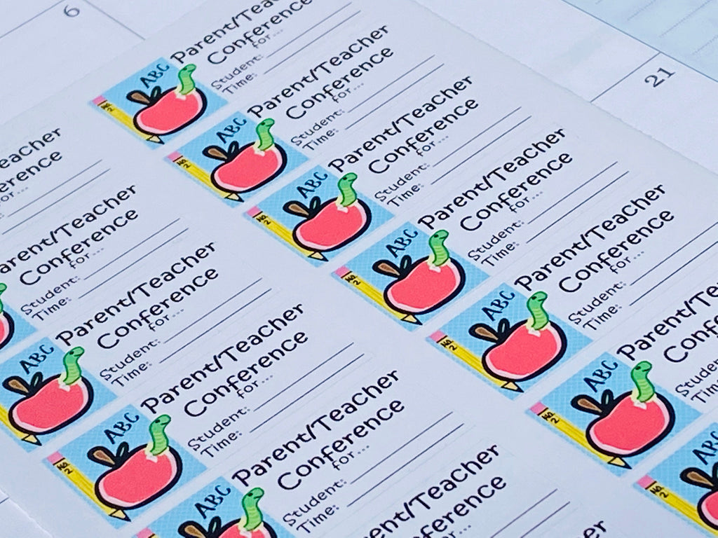 An angle-view and close-up of the parent/teacher conference sticker sheet.