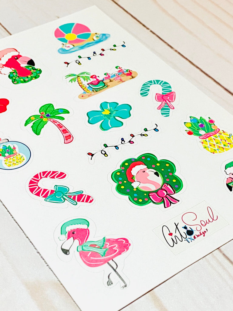 Stickers also include tropical flowers, flamingos with Christmas hats, and decorated palm trees.