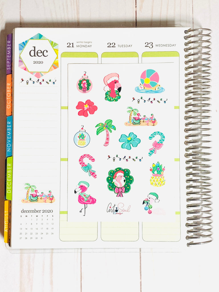 A Tropical Flamingo Christmas Sticker Sheet in an Erin Condren Life planner.